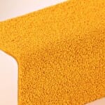 Learn how Stair Nosings like Carborundum Step Edge can assist people by reduce slippage on slippery stairs and floors - gripaction.com.au